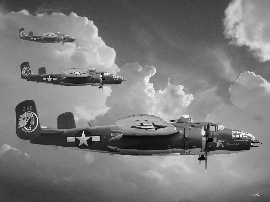 This is a composite picture built using a cloud background and an image from an airshow of a B-25...